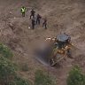 Man crushed after bulldozer rolls at building site north of Brisbane