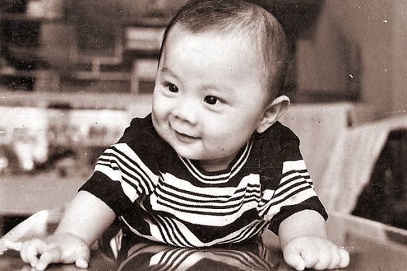 Liberal MP Trung Luu in Vietnam as a baby. The photo is one of just two that survived when his family fled Vietnam after the war.