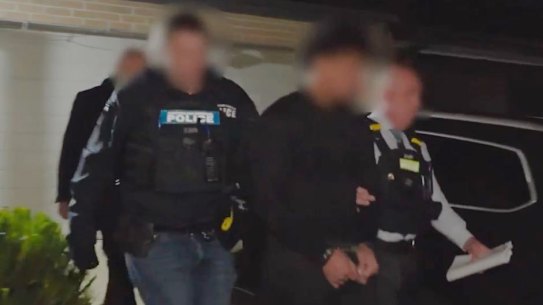 Police arrest a 21-year-old Werribee man on Wednesday over his alleged role in the Adass Israel synagogue fire.