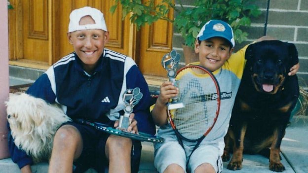 Christos and Nick Kyrgios outside their family home in Canberra as kids.