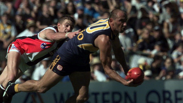St Kilda’s Matthew Lappin in action against West Coast Eagle’s Peter Matera at Subiaco.