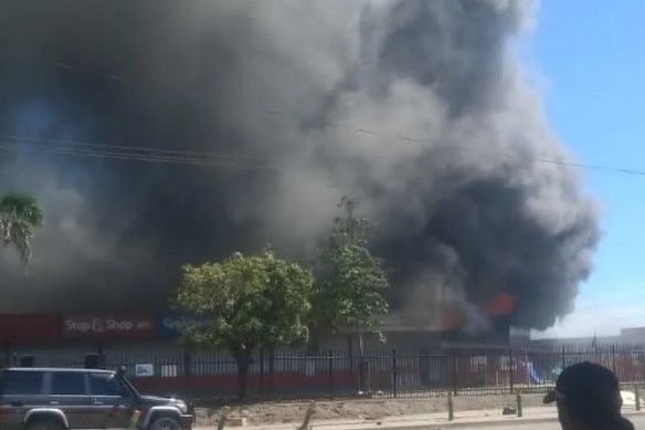 Fires amid looting in Port Moresby.