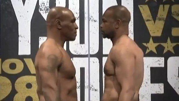 Mike Tyson and Roy Jones Jr at the weigh-in for their fight.