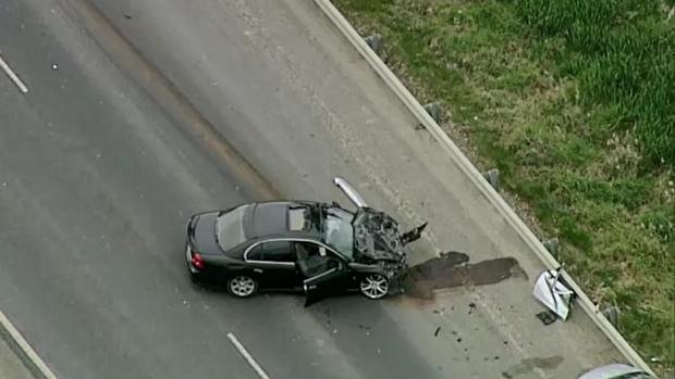 A car at the scene of the crash on the South Gippsland Highway on Friday. 