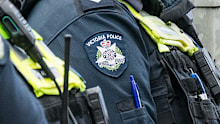 The police officer allegedly stood on a teenager while they were being restrained on the ground.