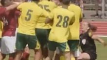 Demoncay on the far right knocked over by scrapping players.