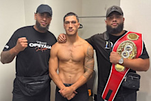 Jai Opetaia poses with Louis Meehan (left).