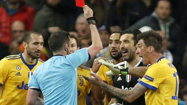 Juventus goalkeeper Gianluigi Buffon is given a red after seeing red.