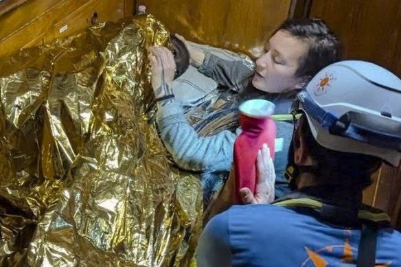 Rescuers attend to the 11-year-old girl from Sierra Leone who was found floating in the Mediterranean Sea. 