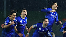 South Melbourne players celebrate a win during the Australia Cup.