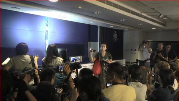 The reporter interrupted the briefing on Monday by reading a statement alleging police mistreatment.