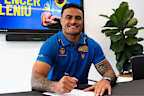 Spencer Leniu signs his Eels contract.