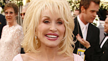 Wearing a custom Robert Behar pink chiffon gown to the 2006 Oscars.
