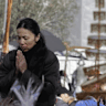 MELBOURNE, AUSTRALIA-MAY 16,2010 Photo of People offering prayers during Buddha's Day and Multicultural Festival at Melbourne s Federation Square on Sunday May 16, 2010.