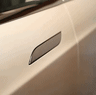 A hidden door handle on a Tesla.