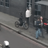 Mobile phone robbery at a London bus stop.