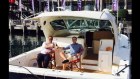 Former McGrath agent Adrian Bo, right, on his boat, "Inappropriate" with his brother Marcello.