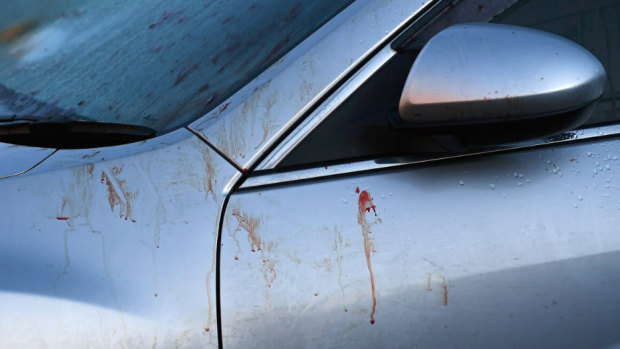 A car at the scene was stained with blood.