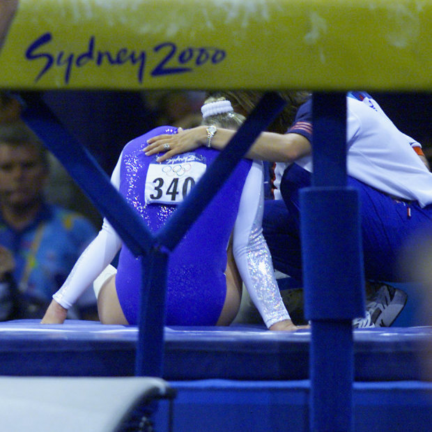 Great Britain's Annika Reeder injures her ankle after falling on the incorrectly set vault.