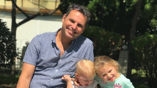 Daniel Duggan pictured with two of his children, Ginger and Hazel.