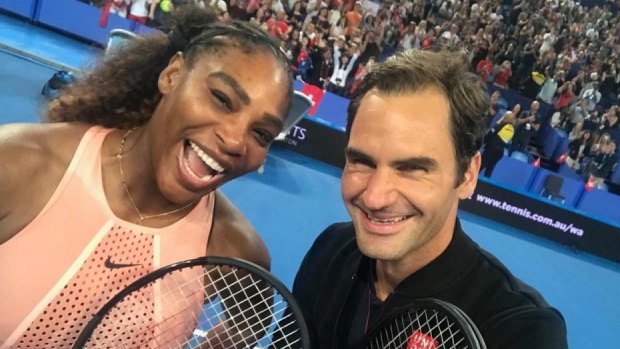 Roger Federer snaps a selfie with Serena Williams at the Hopman Cup in Perth earlier this month.