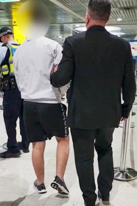 The 20-year-old is arrested at Melbourne Airport on Saturday.