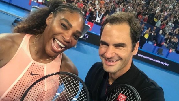 Roger Federer snaps a selfie with Serena Williams at the Hopman Cup in Perth earlier this year.