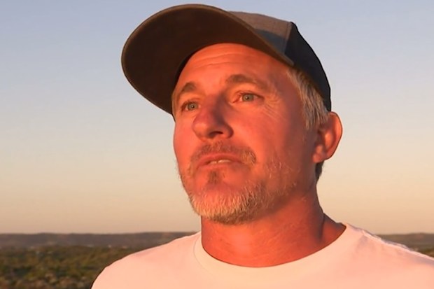 Shannan Dunn thought nothing of paddling into bloodied waters after turning up to Glenfield Beach for a surf.