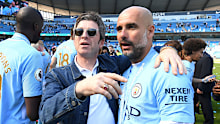 Noel Gallagher speaks to Pep Guardiola.