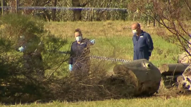 A killer is on the run after a woman's body was found in Royal Park on Saturday morning.