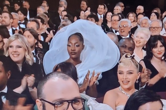 Singer Tems turning heads, and straining necks, at the 95th Annual Academy Awards. 