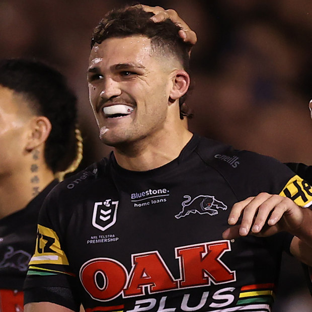 Nathan Cleary and Dylan Edwards celebrate a Panthers try.