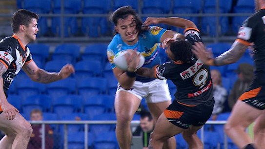 Turn away, Freddy: Brad Fittler would have hated the sight of Api Koroisau suffering a suspected broken jaw in this tackle.