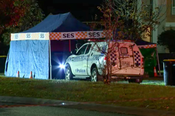 An SES tent was set up around the BMW, which had a hole through the windscreen.