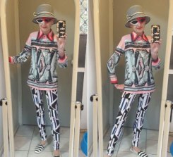 Michelle Trebilco posa con un outfit messo insieme in un op shop.