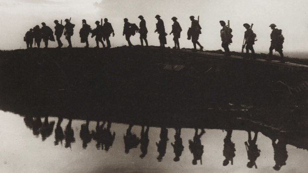 October 5, 1917: Supporting troops of the 1st Australian Division walking on a duckboard track near Hooge, in the Ypres Sector.