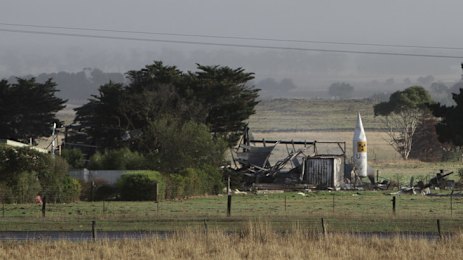 A rocket is almost unscathed after explosions destroyed Glenn Sanders’ farm.