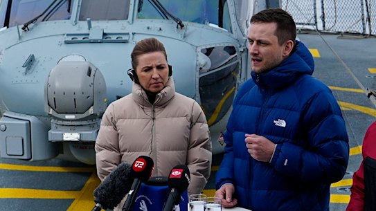Danish Prime Minister Mette Frederiksen, with Greenland’s acting head of government Múte Bourup Egede, right, and newly elected head of government Jens-Frederik Nielsen, centre, on board the Danish Navy inspection ship Vaedderen, in Nuuk, Greenland, on Thursday.