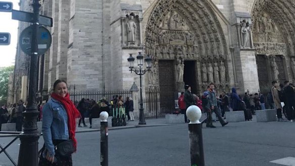 Mary Dullard out the front of the Notre-Dame in Paris just hours before fire gutted the historic cathedral.