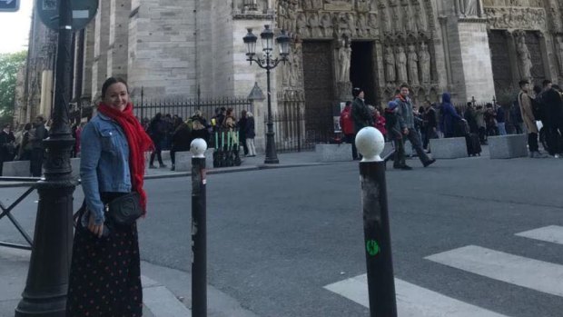 Mary Dullard out the front of the Notre Dame in Paris, just hours before fire gutted the historic cathedral.