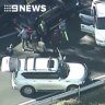 Police shoot alleged gunman after wild chase closes Bruce Highway