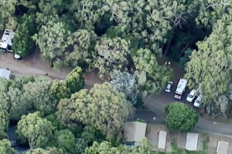 A man has tragically died after a tree branch fell on his tent in Healesville.