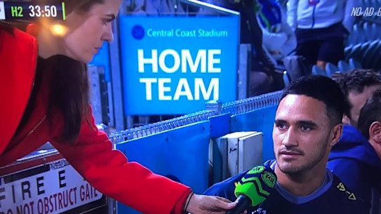 Fox Sports reporter Hannah Hollis breaching NRL distancing protocols during an interview with Valentine Holmes