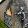 Banksy mural on garage in Wales sells for six-figure sum