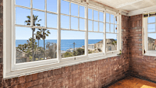 Young family trumps developer in fierce $7m battle for Maroubra ‘time capsule’