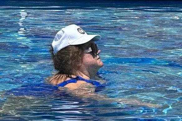 Mining magnate Gina Rinehart taking a dip in the hotel pool.