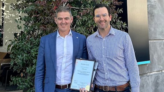 Nick Carah (left) with Hawthorn premiership player Jordan Lewis.