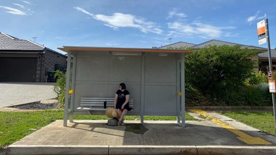 Juliana waits anxiously for the once-an-hour bus from Kurunjang to Melton Station for her train to university.