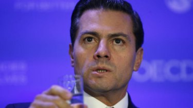 'False and defamatory:' Mexican President Enrique Pena Nieto.