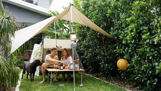 Eugen Schledewitz and Kelly Bang camped in their backyard in Salisbury, in Brisbane's south.